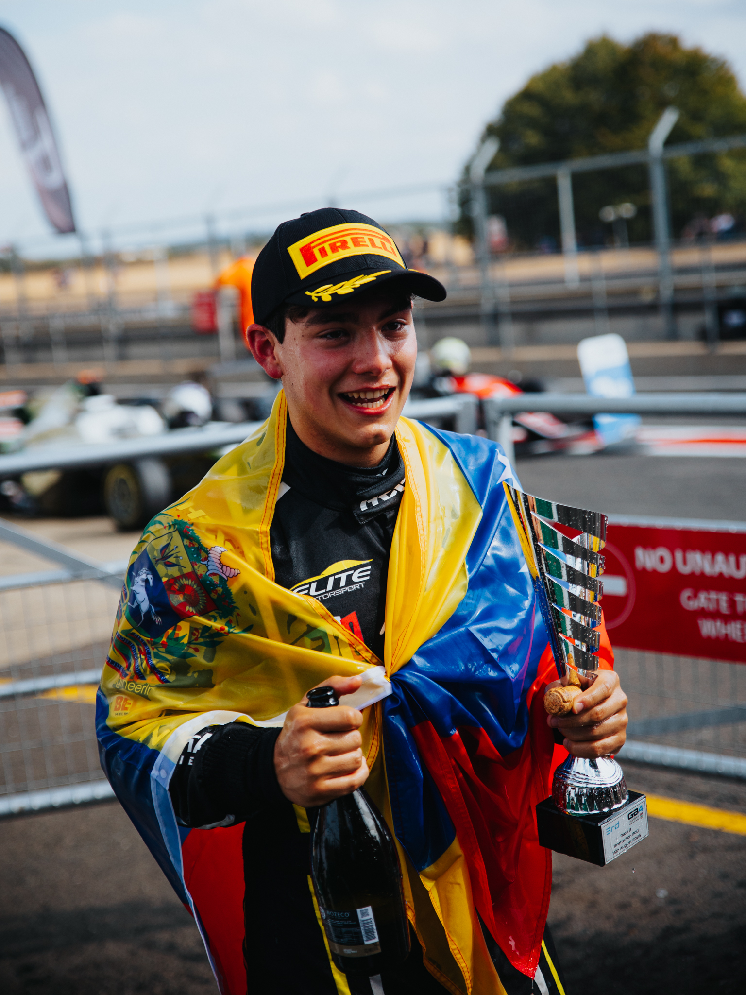 Del Grosso podium celebration Venezuelan flag