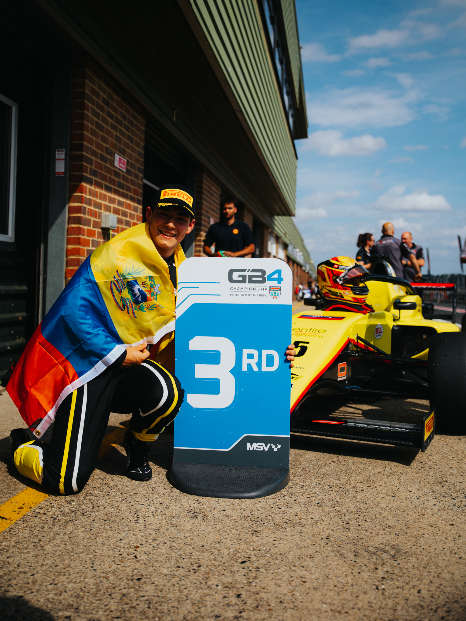 Del Grosso P3 podium Snetterton with Venezuelan flag